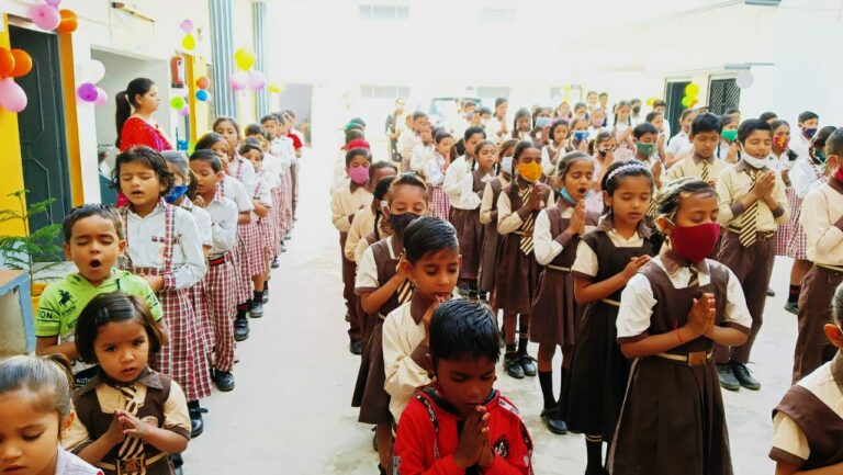 Students lined up for morning assembly at J.R.V. Institute