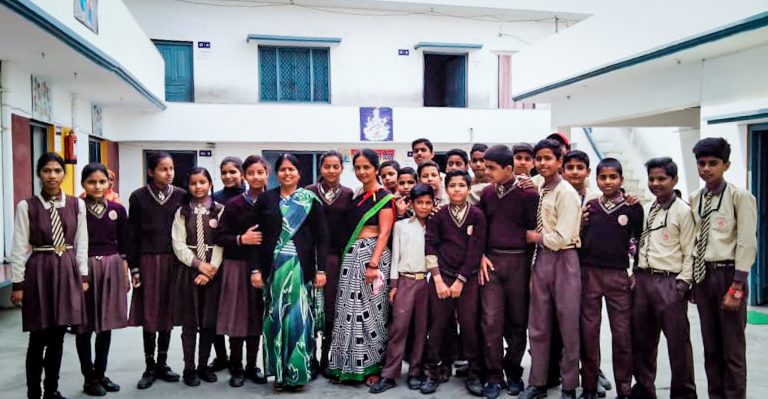 Students with staff members at J.R.V. Institute